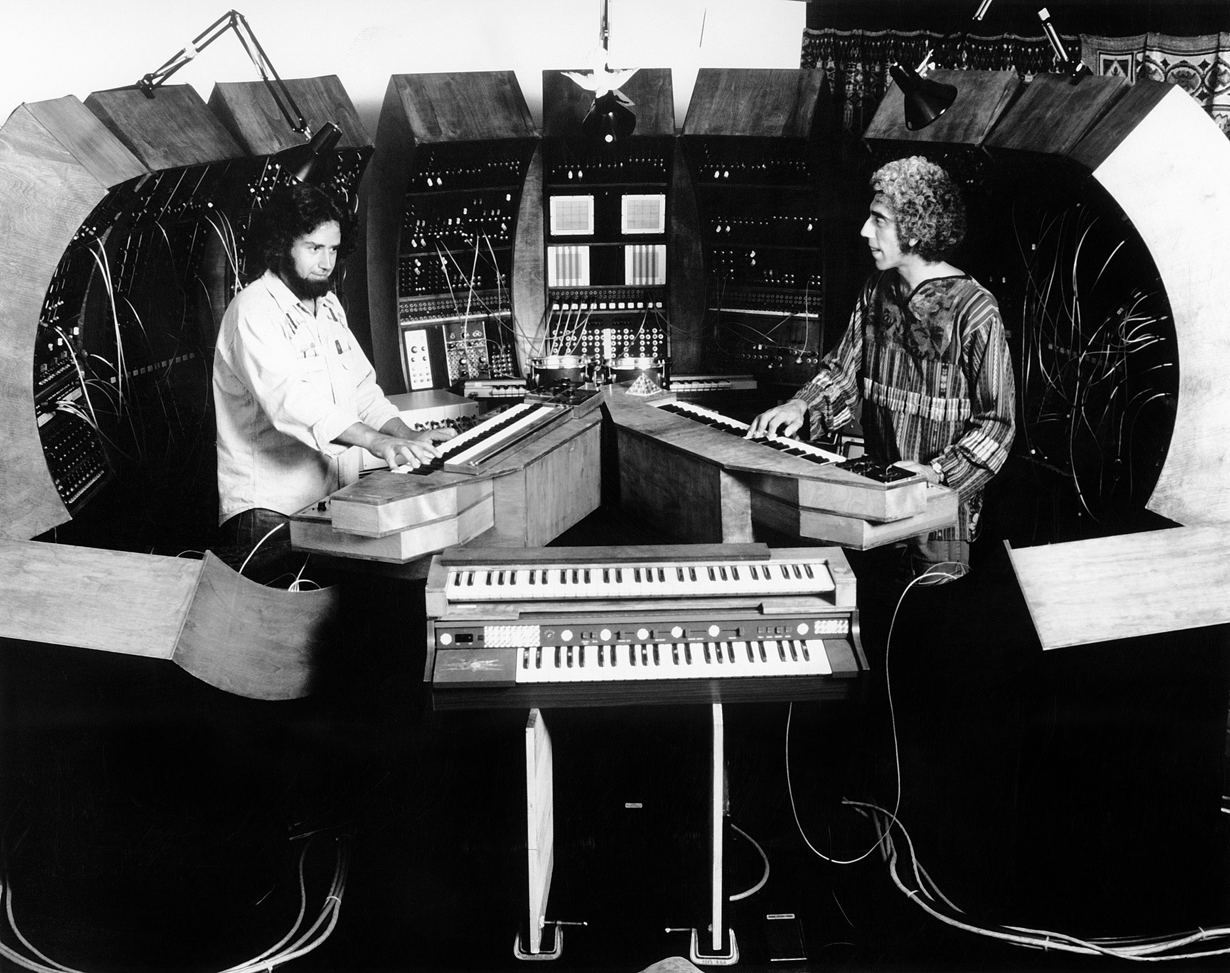 Production and engineering duo—and synthesizer pioneers—American Robert Margouleff (left) and British Malcolm Cecil (a former jazz bassist) play their self-built creation, TONTO (The Original New Timbral Orchestra), circa 1974. Photo via Michael Ochs Archives/Getty Images.
